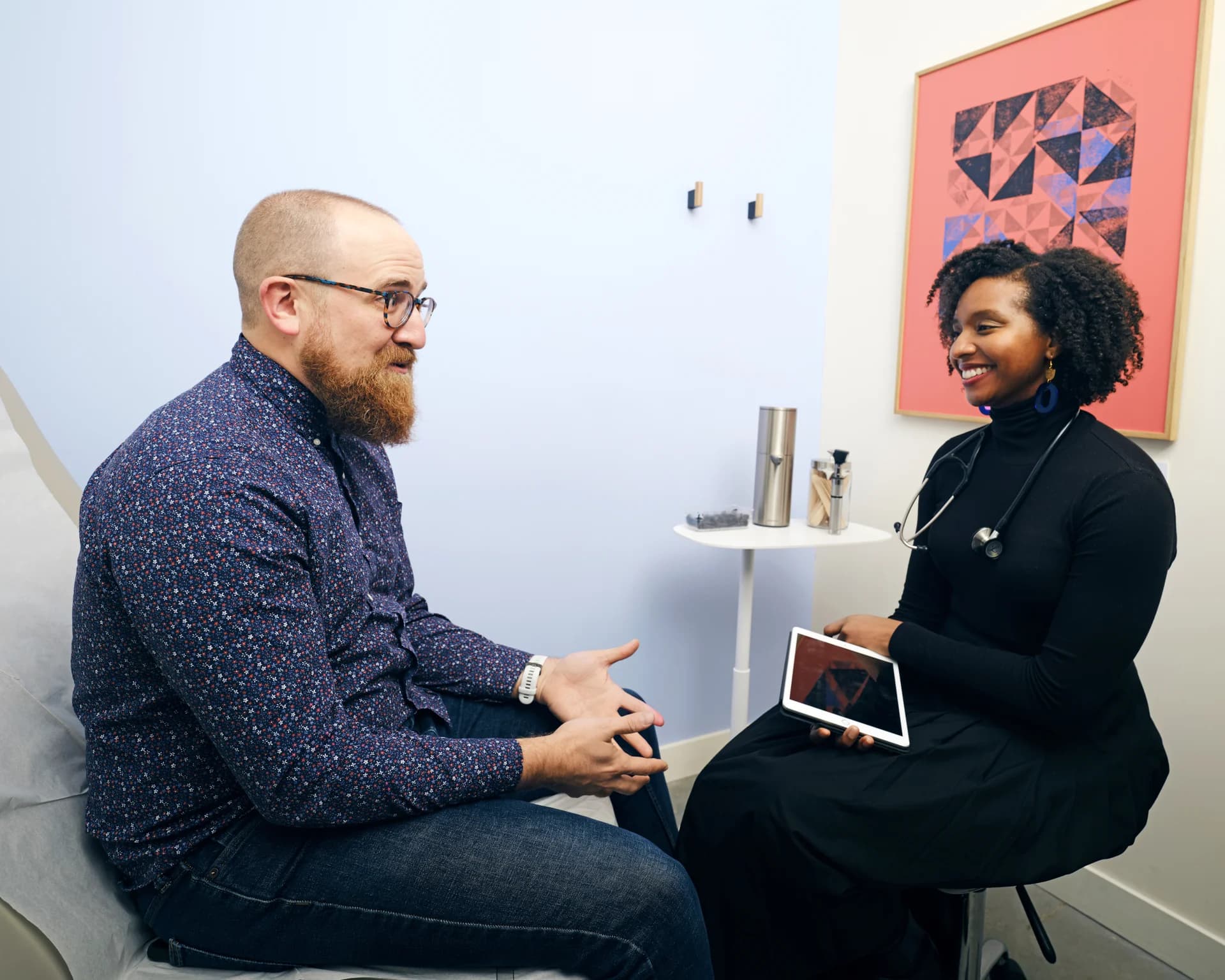 A Morningside Medical clinician with a patient